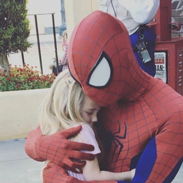 Kids like spiderman because he saves the world and helps others